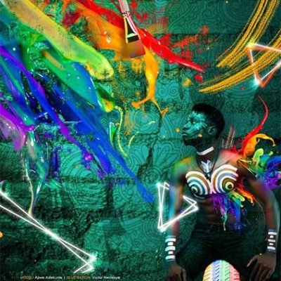 Victor Nwokoye photo-manipulation of kunle looking sideways and sitting on a colorful tire, with colors splashing around him
